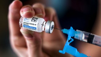 Johnson & Johnson (Janssen) COVID-19 vaccine being inserted into needle